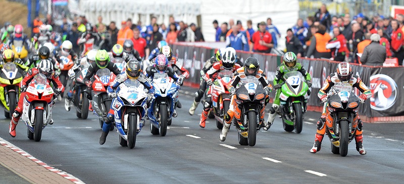 PACEMAKER, BELFAST, 16/5/2013: John McGuinness leads the Supersport pack off the line this evening. PICTURE BY STEPHEN DAVISON